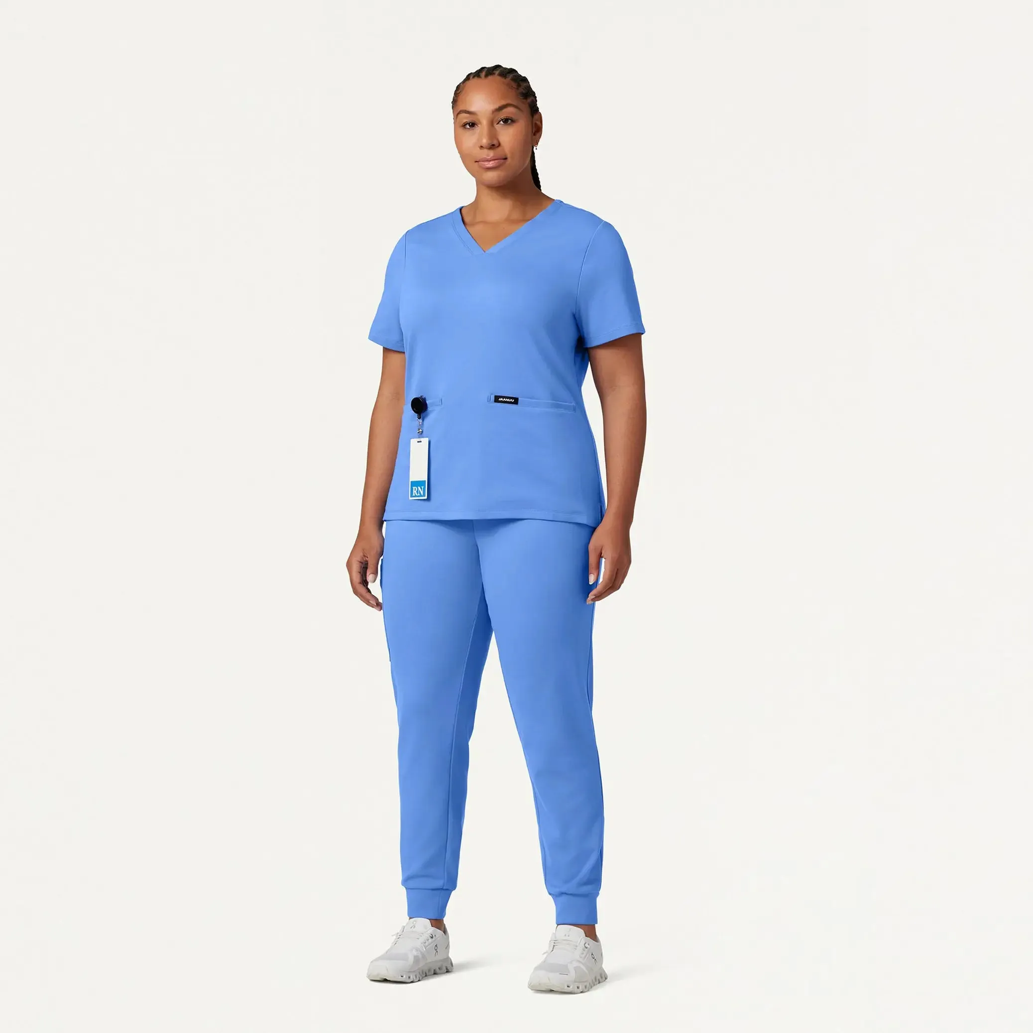 Jaanuu Women's Cesi Slim ULTRAsoft Scrub Top - Ceil Blue