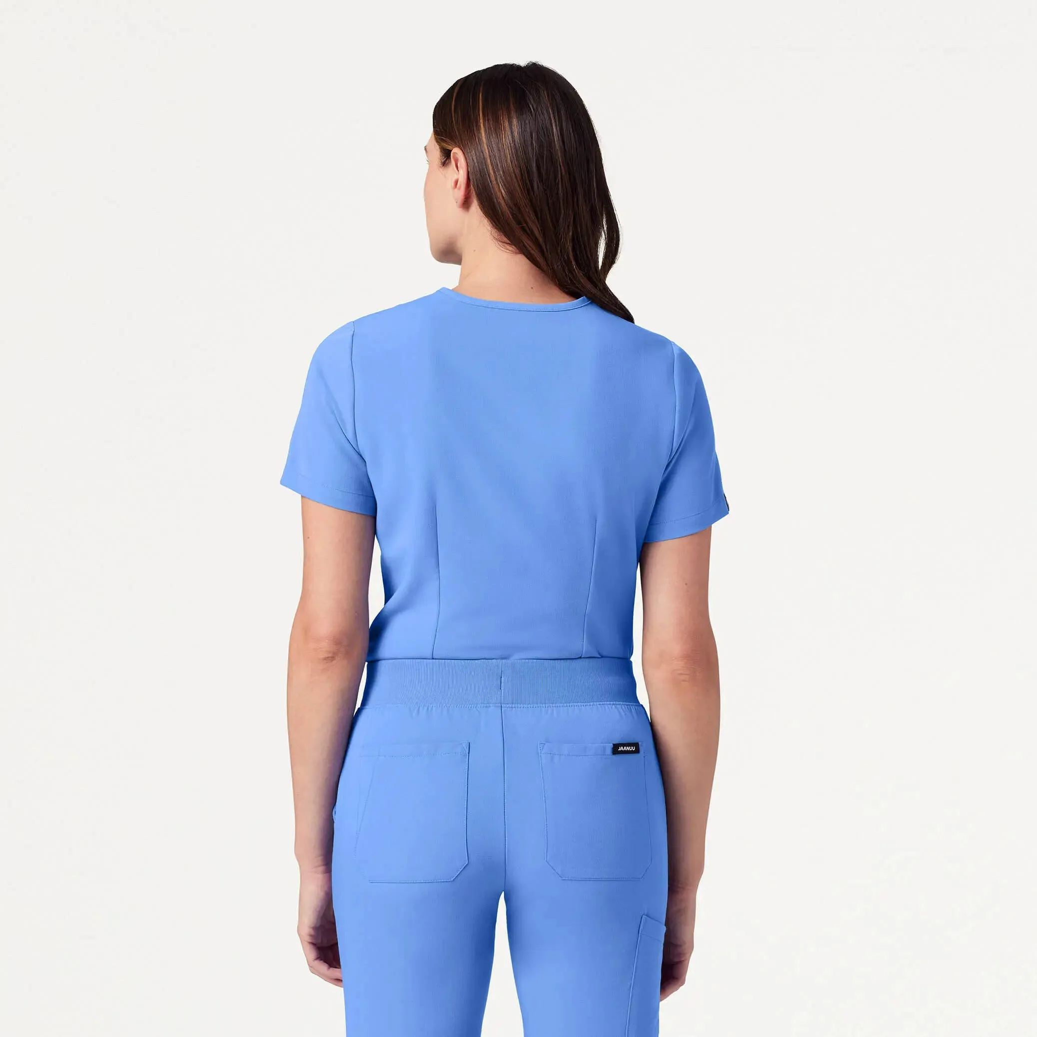 Jaanuu Women's Rhena Slim Essential 1-Pocket Scrub Top - Ceil Blue